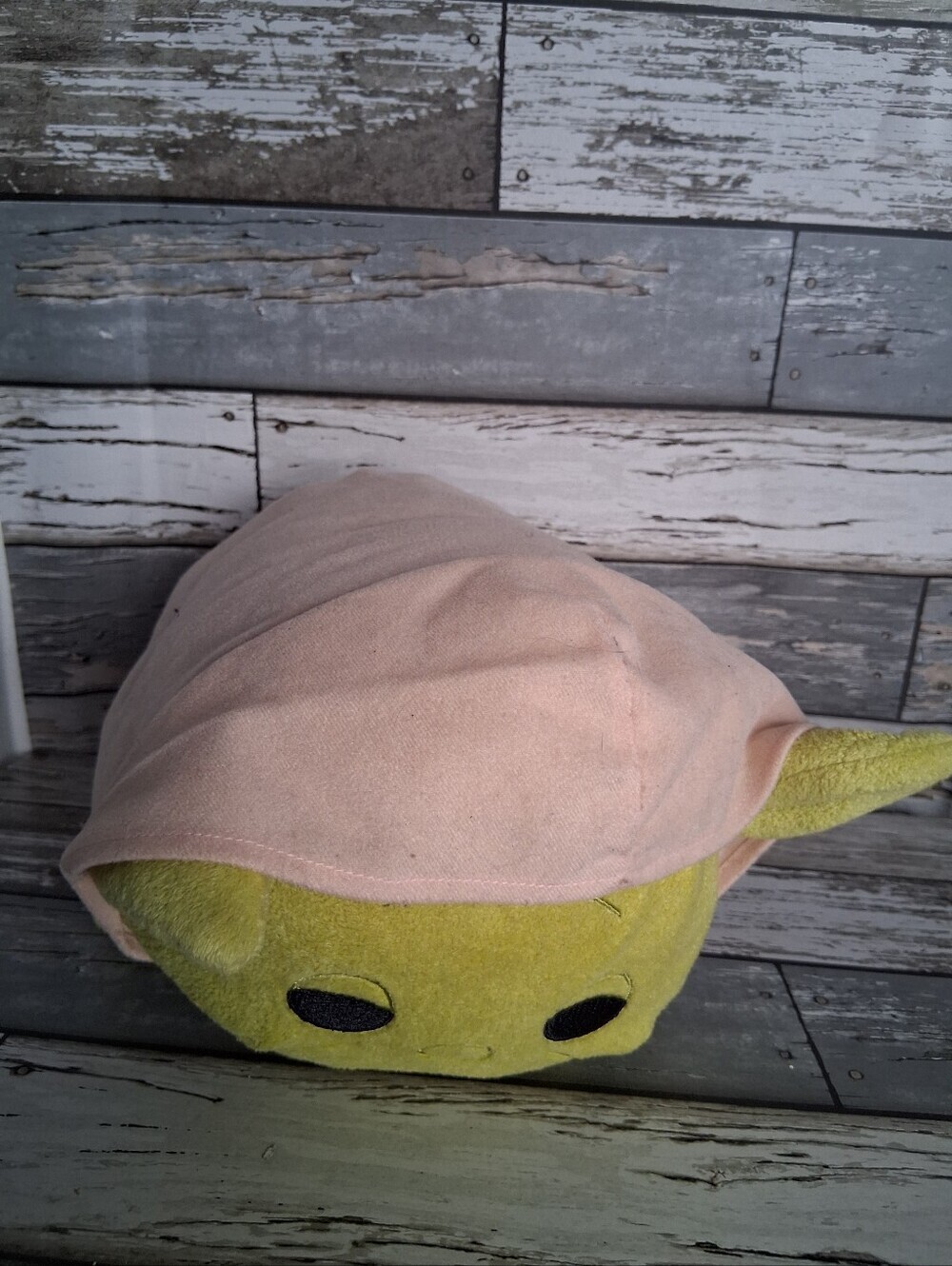 Green Plush Character with Pink Hooded Wrap